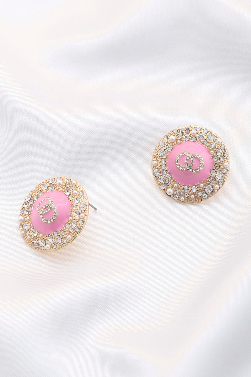Double circle round metal earrings with pink center and sparkling rhinestone border