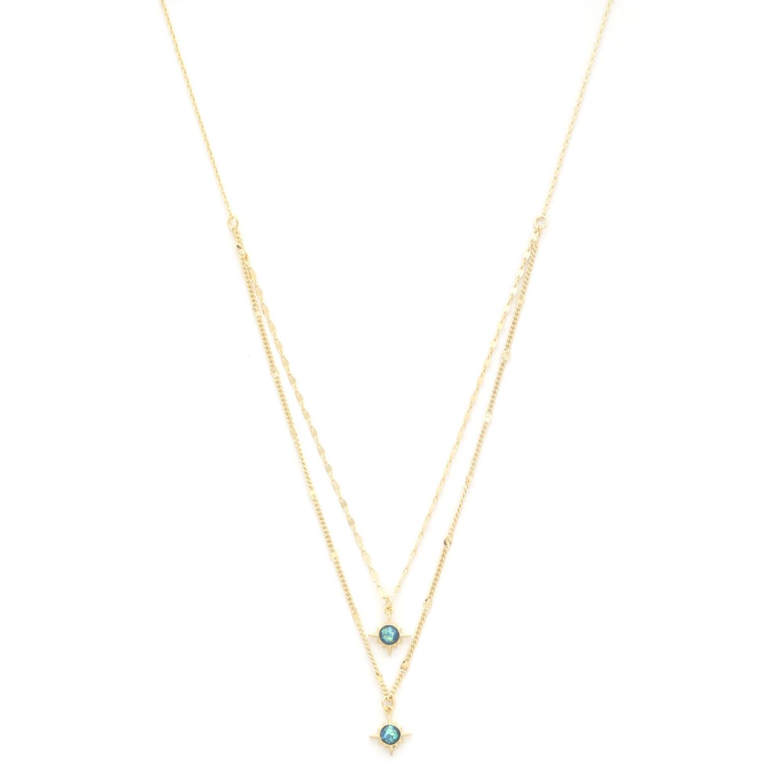 Gold layered crystal necklace with two small star pendants and teal round stones