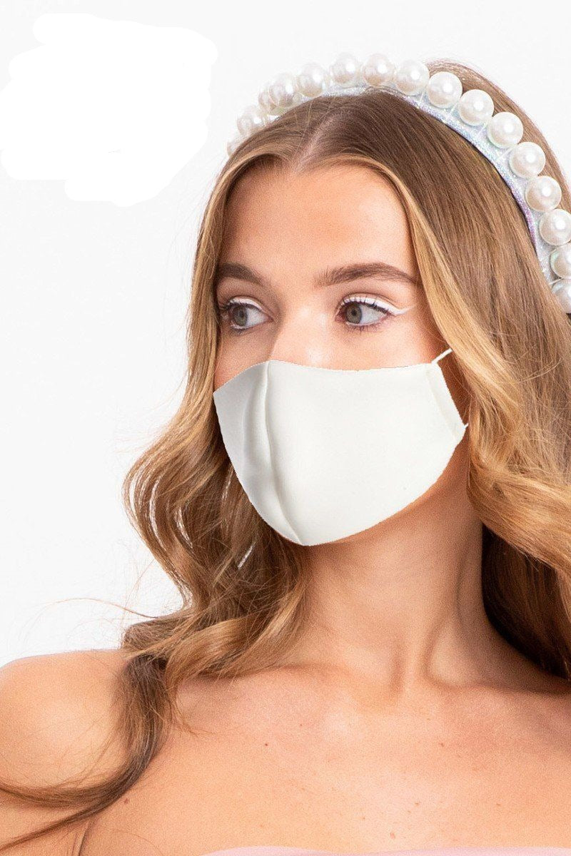White 3D reusable face mask worn over nose and mouth
