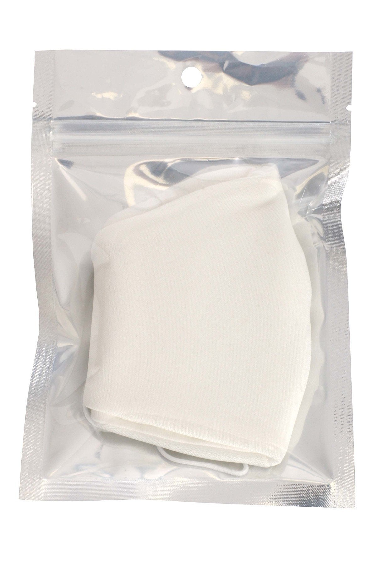 Set of 3 white reusable face masks folded inside clear pouch