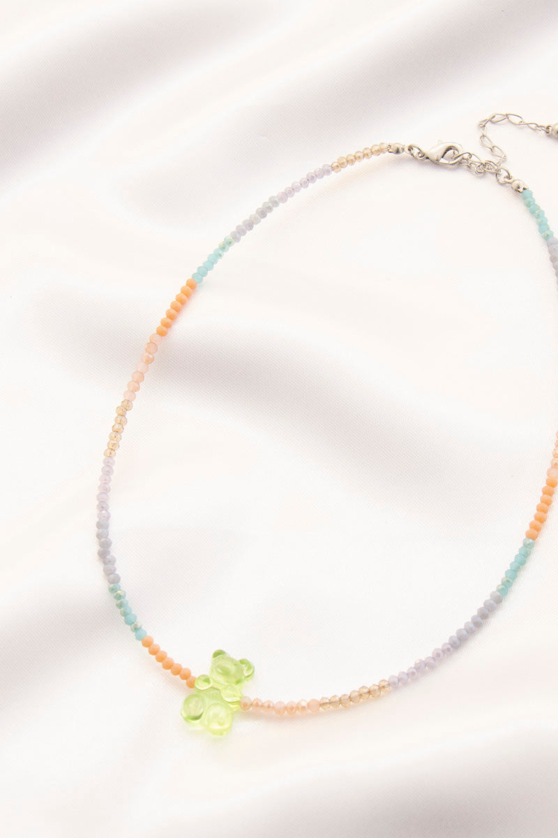 Gummy bear beaded necklace with pastel rainbow beads and silver clasp, light green bear charm