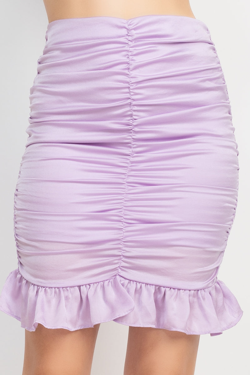 Lavender ruched mini skirt close-up with gathered ruffle hem