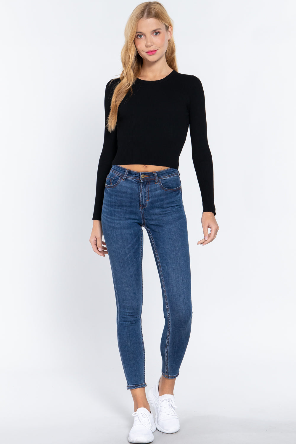 Black long-sleeve sweater top, crew neckline and slim ribbed fit