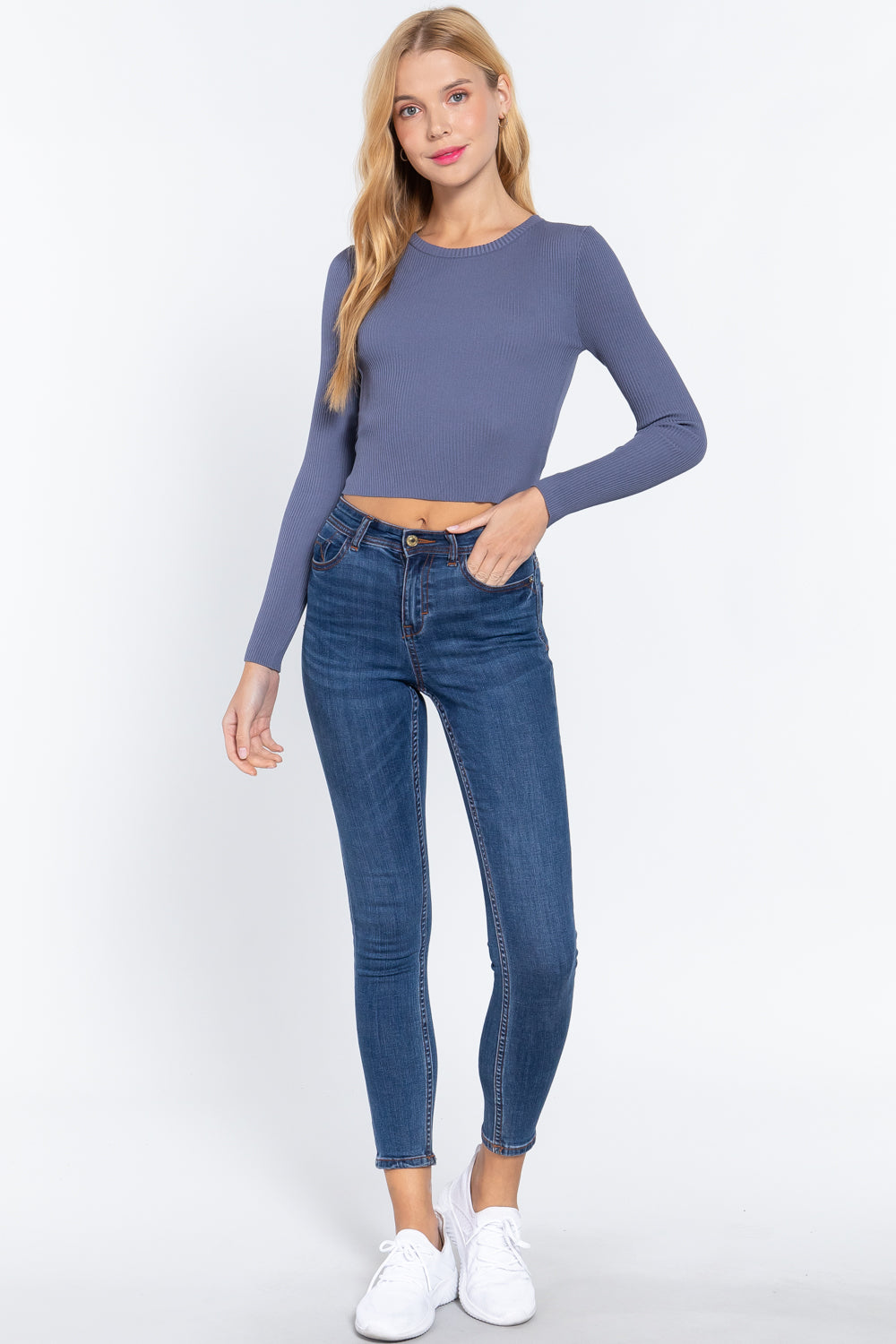 Blue long-sleeve sweater top with slim ribbed texture and crew neckline