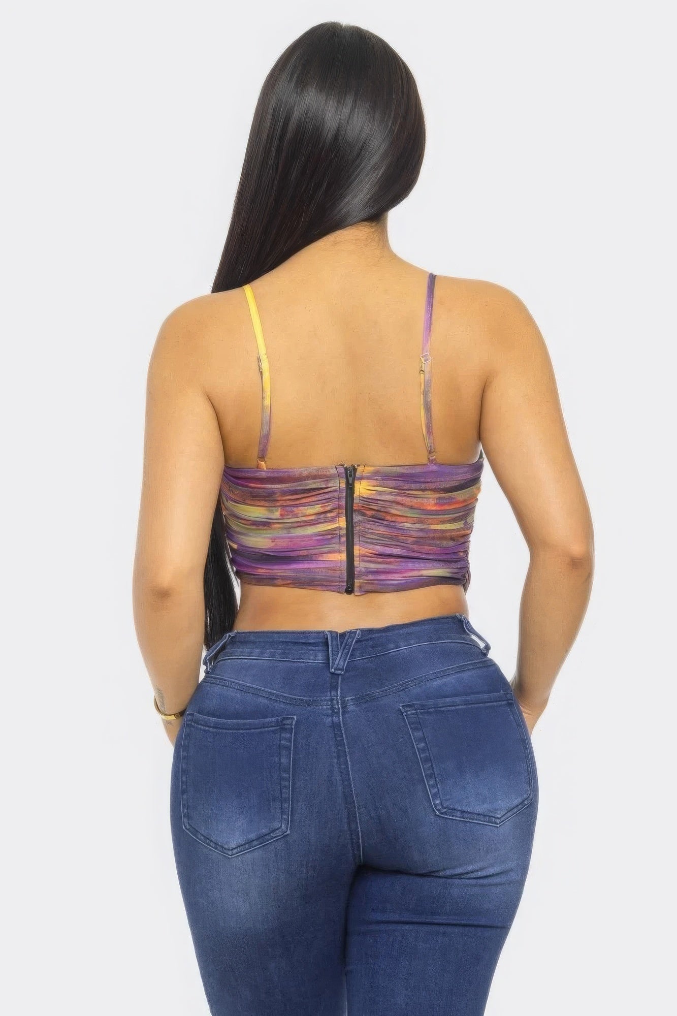 Back view of mesh print crop top with spaghetti straps and center seam