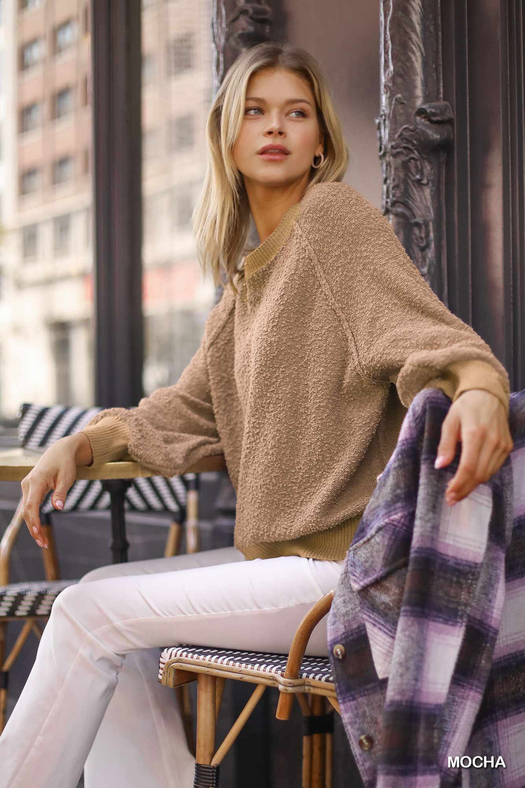 Mocha puff-sleeve boat-neck sweater, textured knit with wide sleeves and ribbed hem.