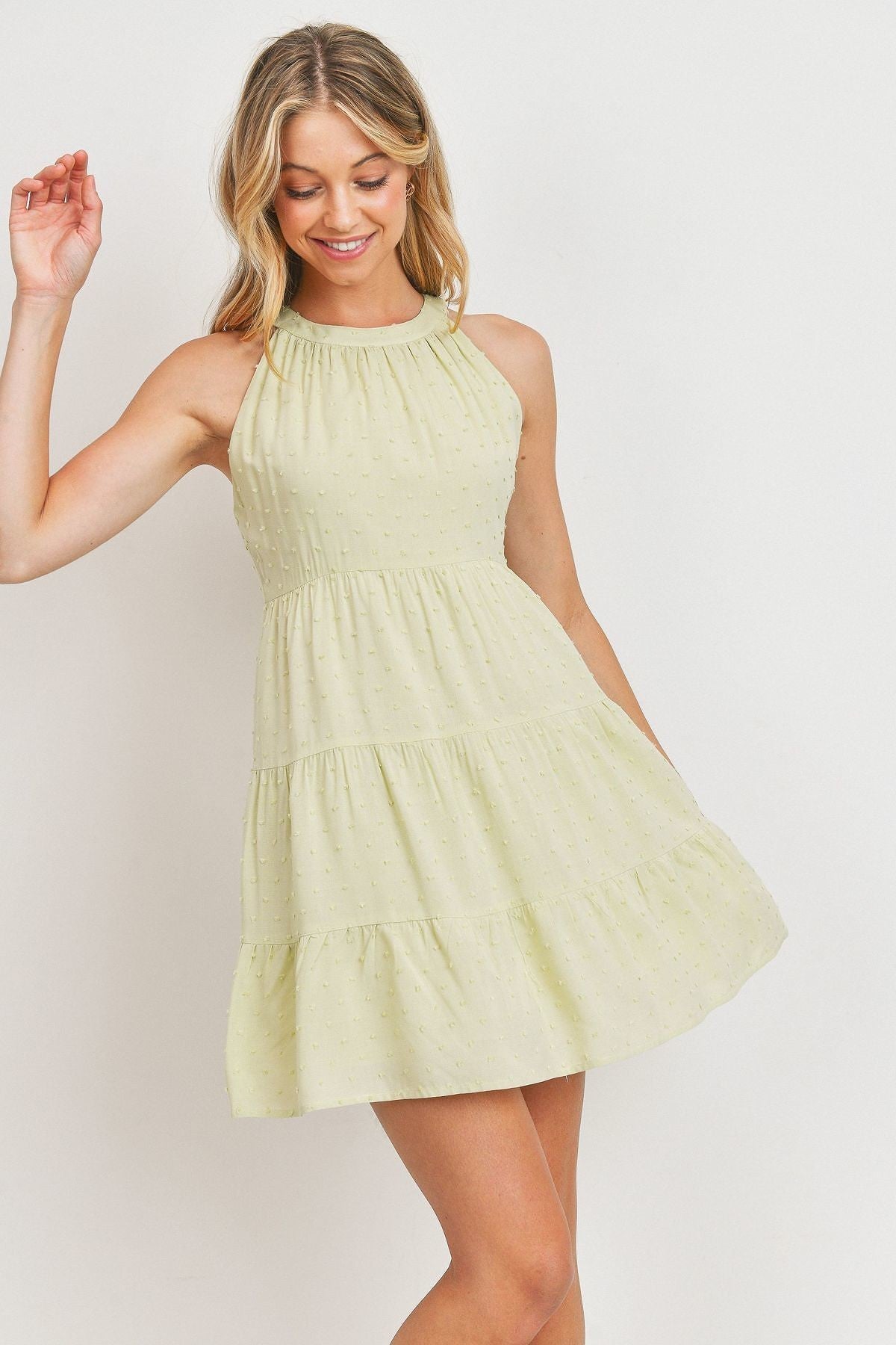 Light yellow dotted Swiss roundneck sleeveless dress with layered tiered skirt