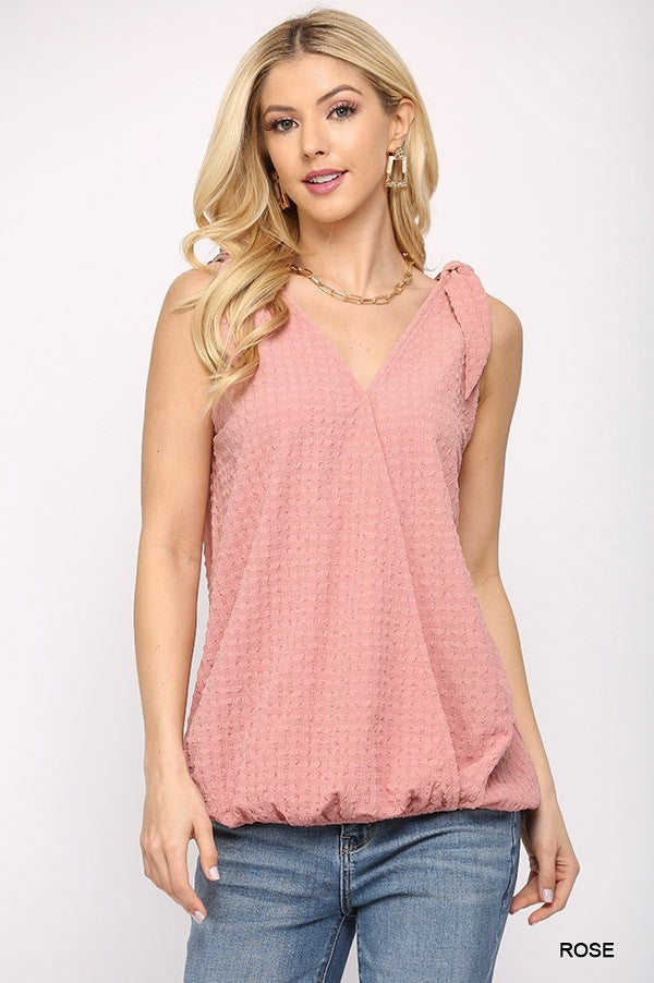 Sleeveless surplice top in Rose with shoulder tie, textured fabric and V-neckline