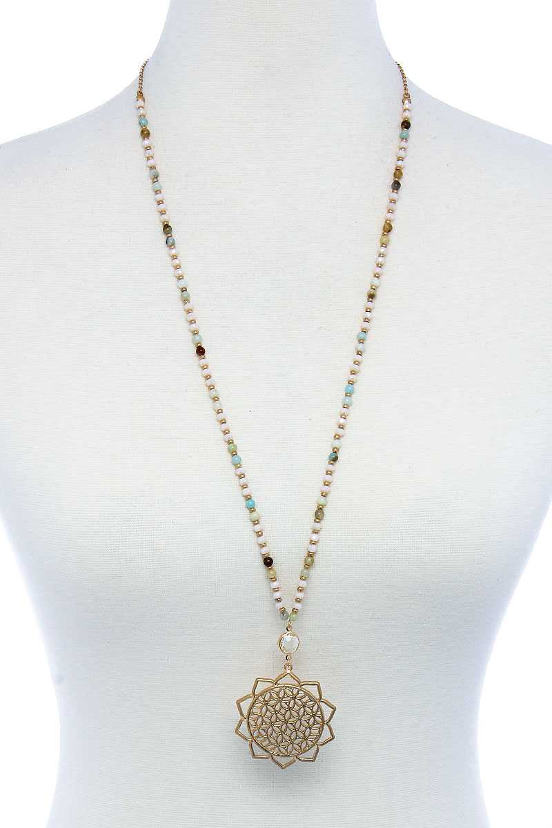 Beaded necklace with gold sunflower drop charm; light mint and cream bead strands